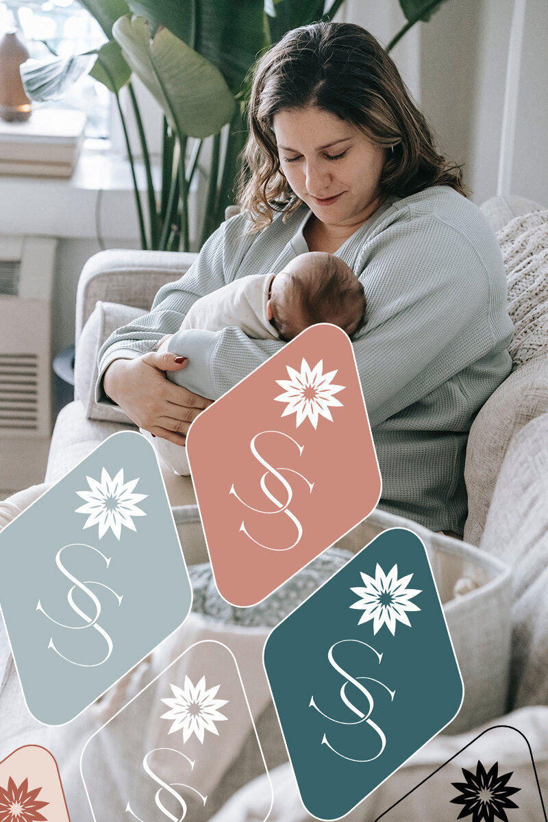 A mother holding her newborn baby while sitting on a couch with several submarks aligned diagonally in the left bottom corner to highlight the brand colors of soft pinks and blues and including the submark of two 'S's intertwined with a star above and in a rounded diamond shape background