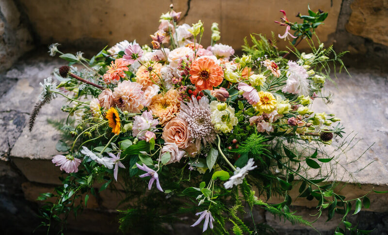 Warm, autumnal wedding flowers by the little flower hut