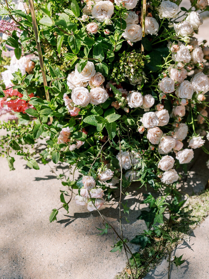  an overflowing bouquet of flowers during a high-end wedding ceremony in Southern California