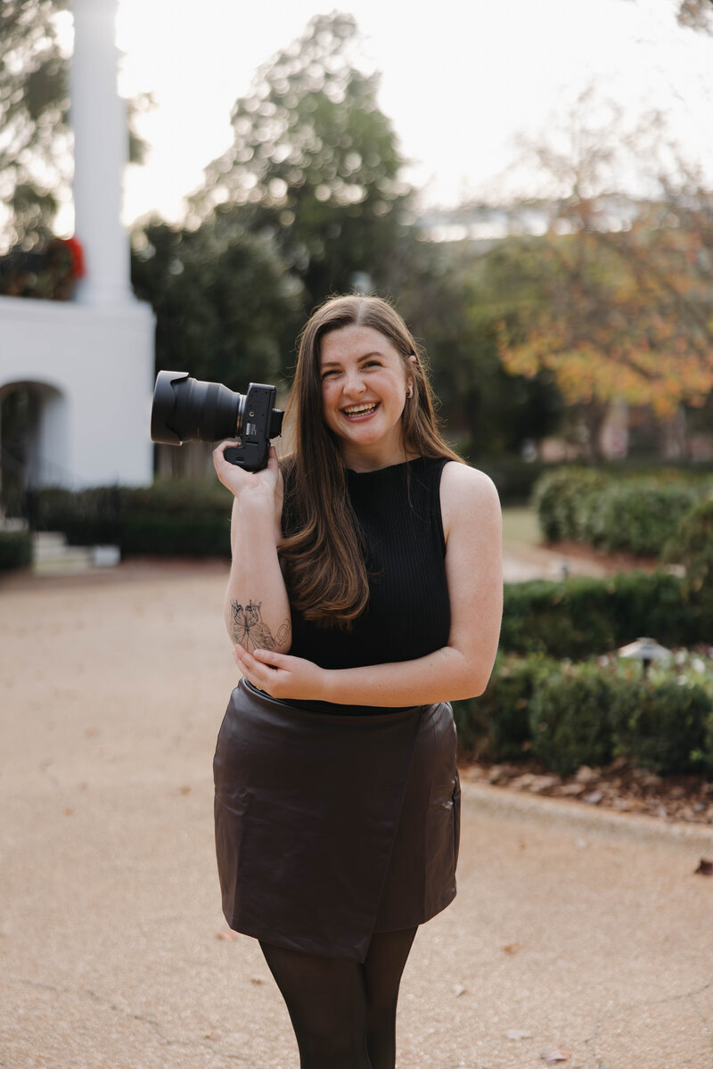 Wedding photographer headshot in front of University of Alabama President’s Mansion”