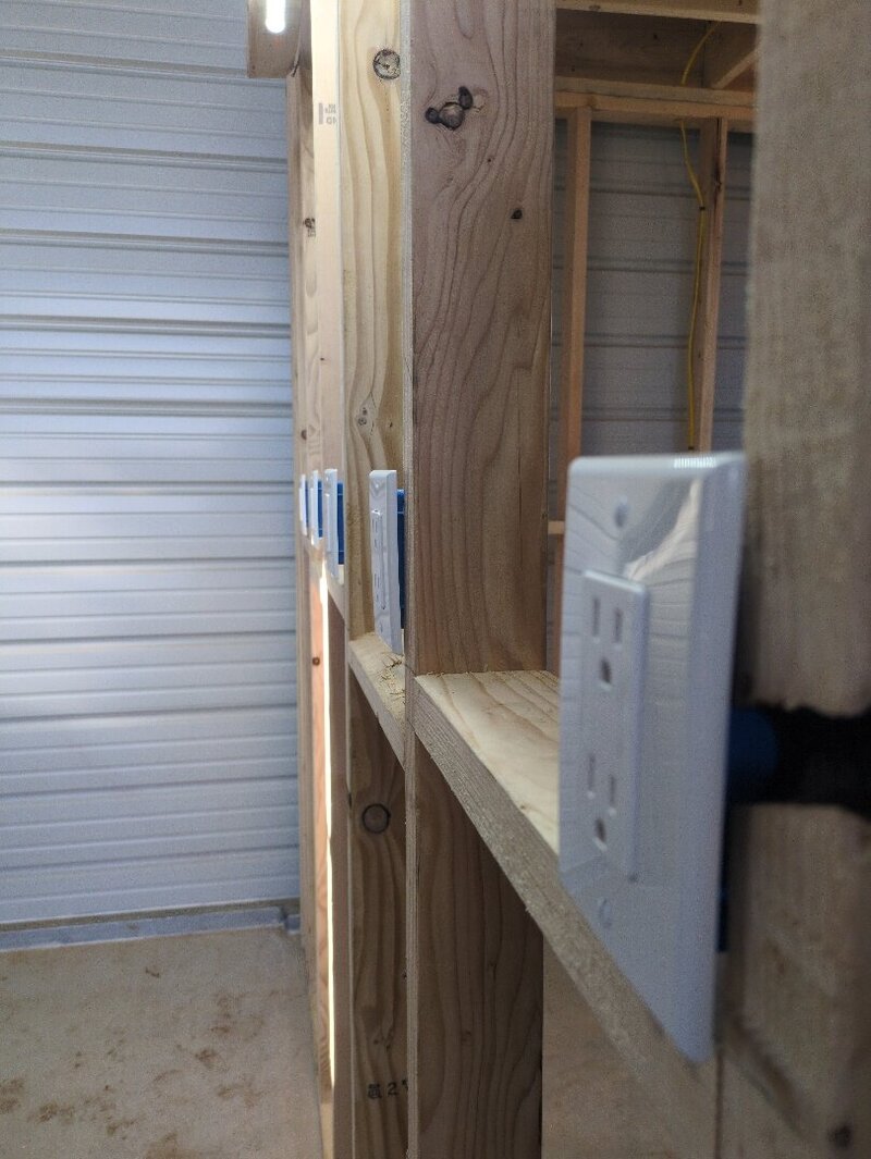 A wall with outlet and switch replacements near Albuquerque