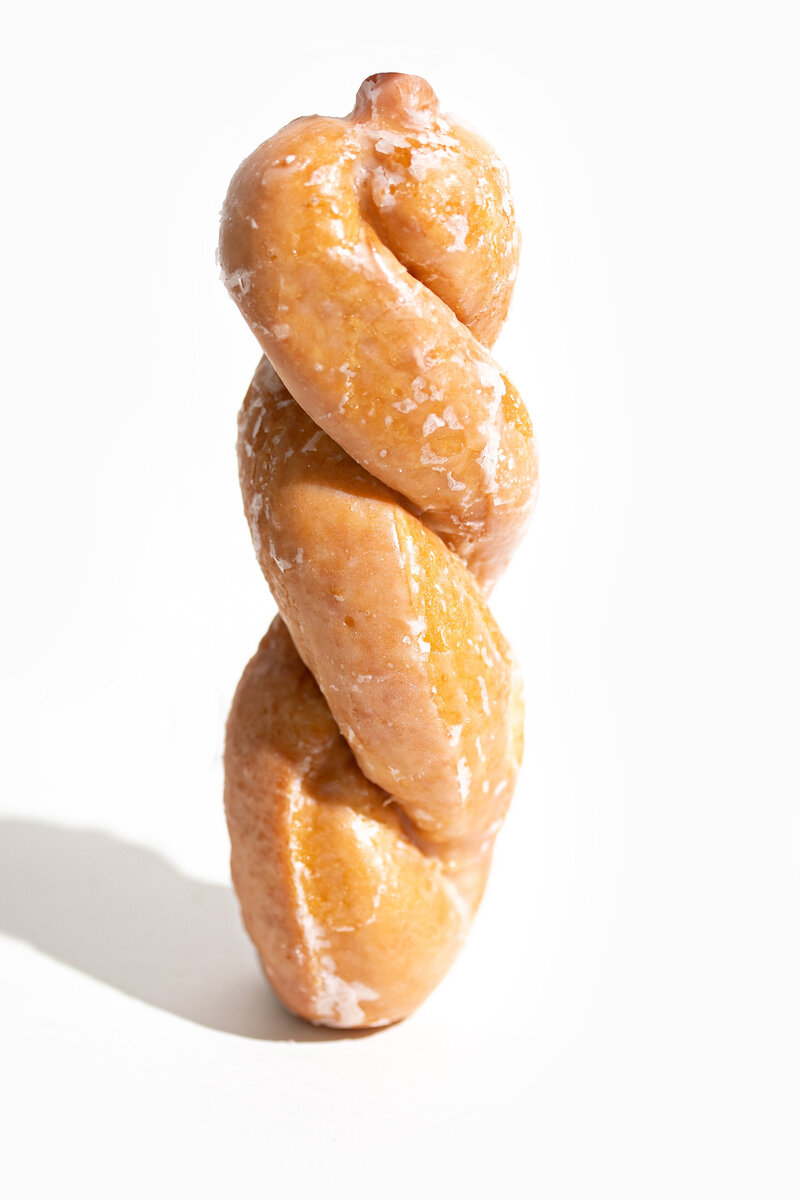 Twisted Donut on white background - Daylight Donuts