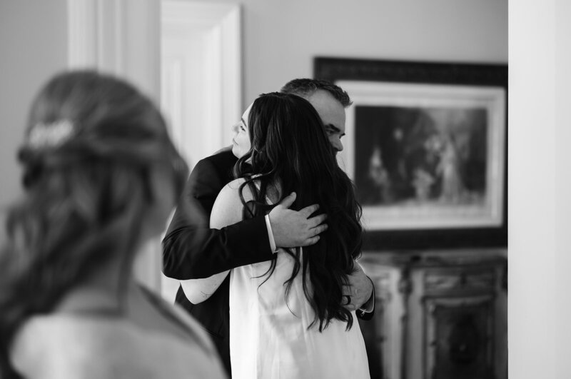 bride-hugs-dad-first-look