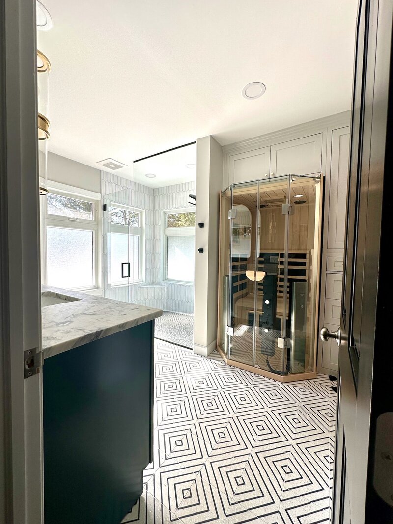 Bright white bathroom with a classic tiled pattern on the floor