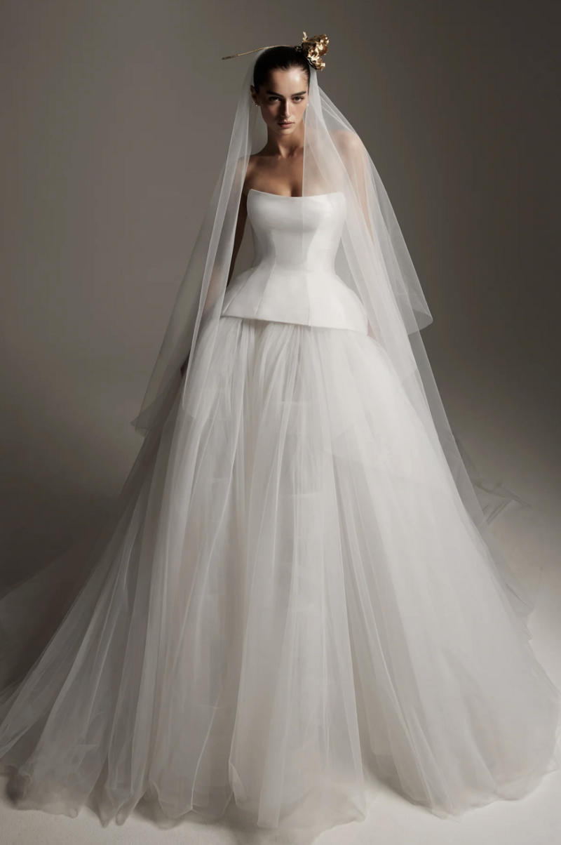 Mikado and tulle drop waist peplum corset with tulle ball gown skirt