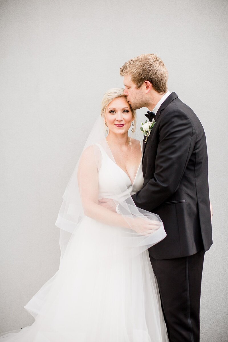 kiss on the temple by Knoxville Wedding Photographer, Amanda May Photos