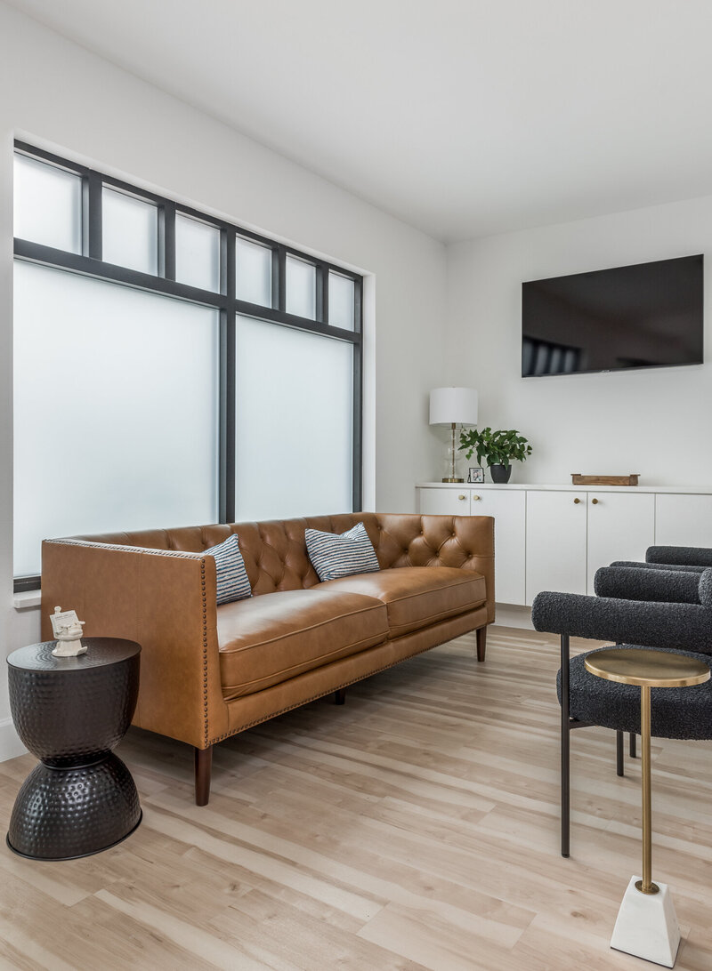 Leather couch and waiting room details_Scarbro Design