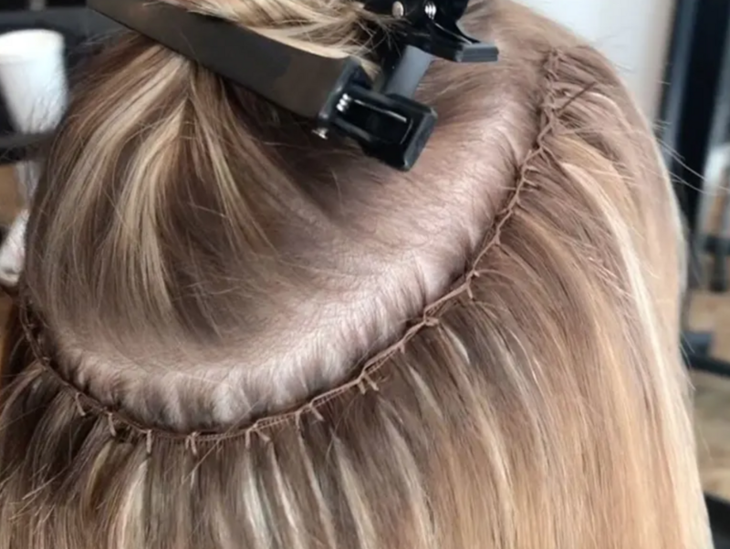 hand tied  hair extensions during process