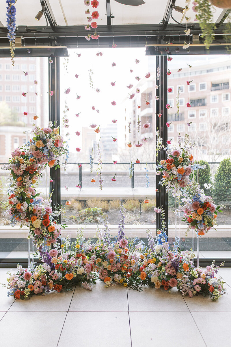 lush florals for a wedding ceremony at the Ritz Solarium in St Louis