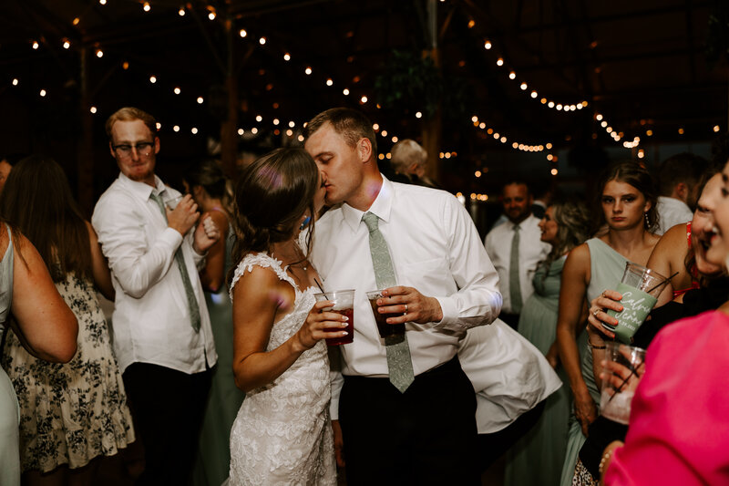 man and woman dancing at wedding