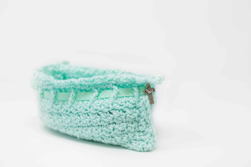 cross on green cradle for stillborn baby in heaven