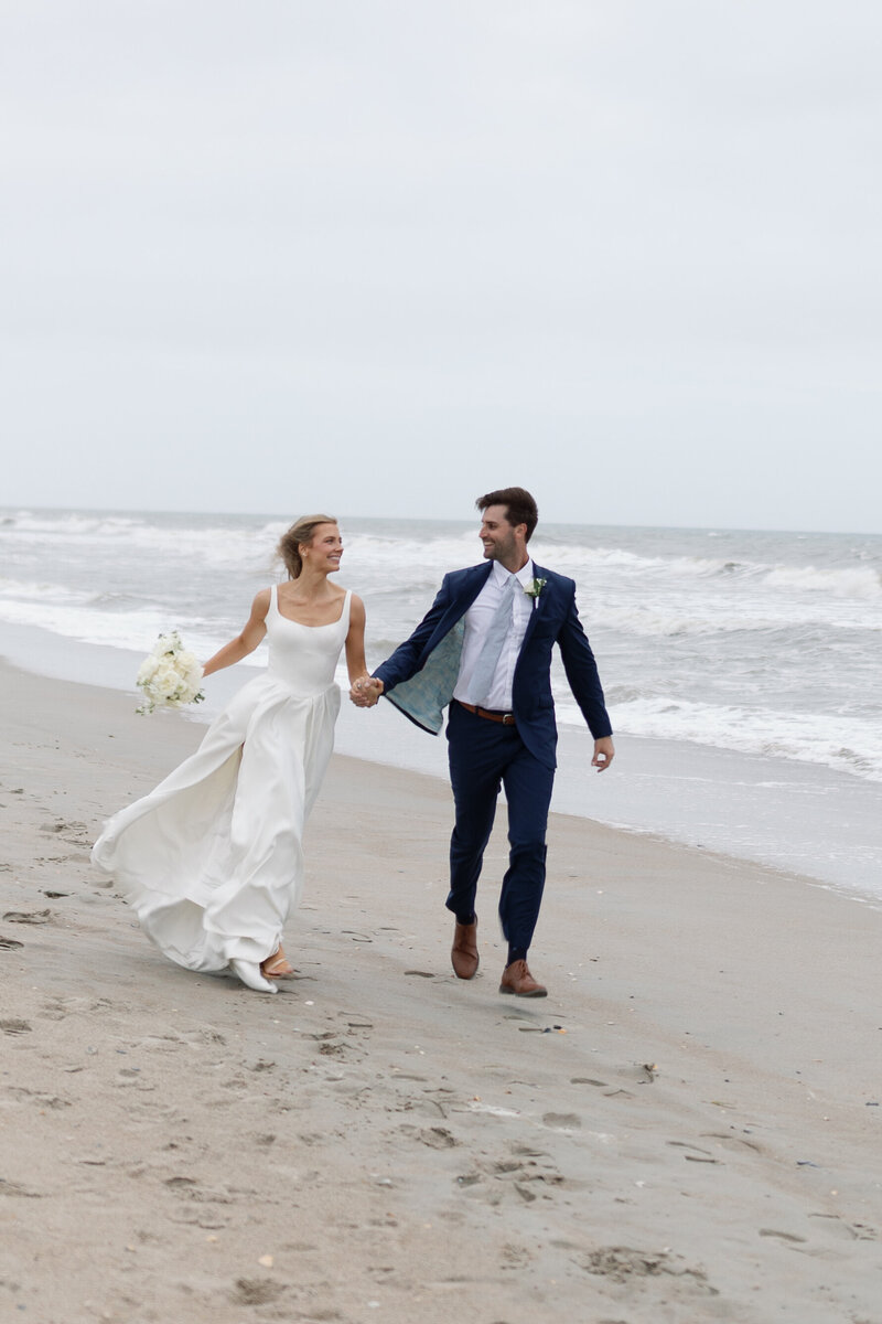 Golden hour wedding on Atlantic Beach, NC dunes – emotional coastal session.