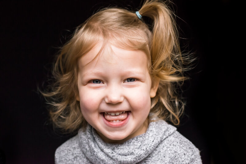 preschool girl laughing