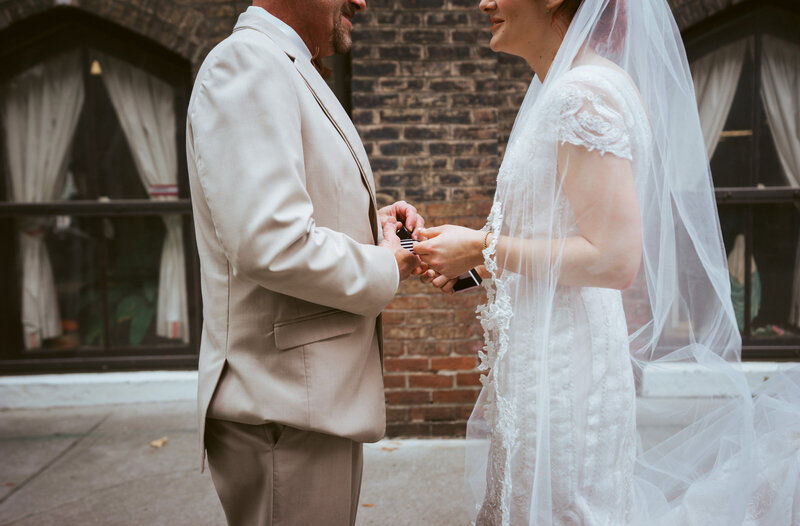 bride and father holding hands