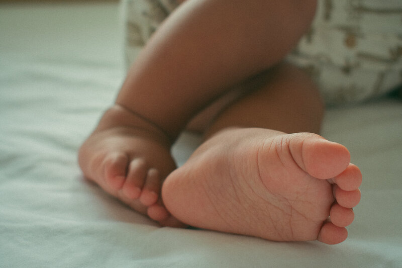 Baby feet on mat