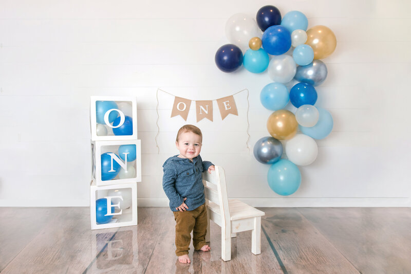 1st Birthday Milestone Photo Boy Holding Chair