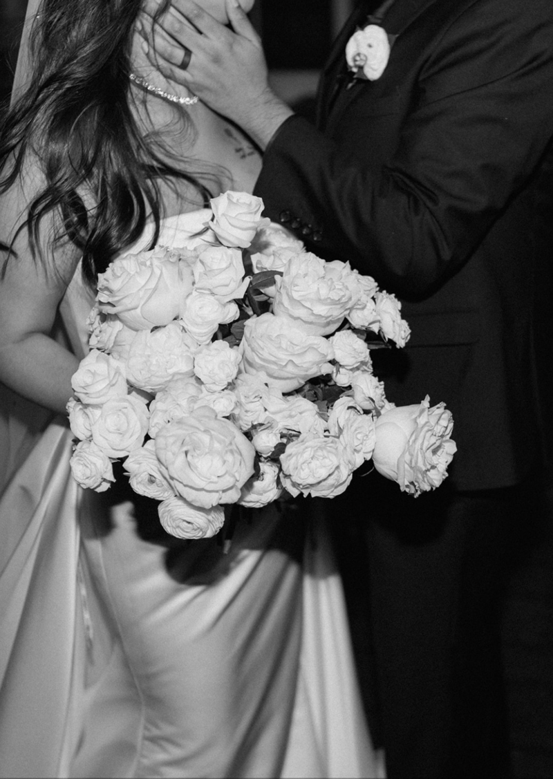 Lorena & Jorge take couples photos during the evening of their November wedding 