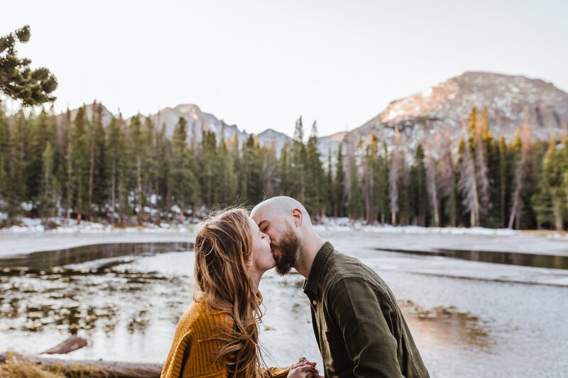 Surprise proposal in Rocky Mountain National Park, taken by Asheville wedding photographers.