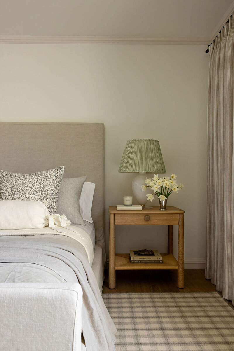 Primary suite with neutral palette and elegant molding details
