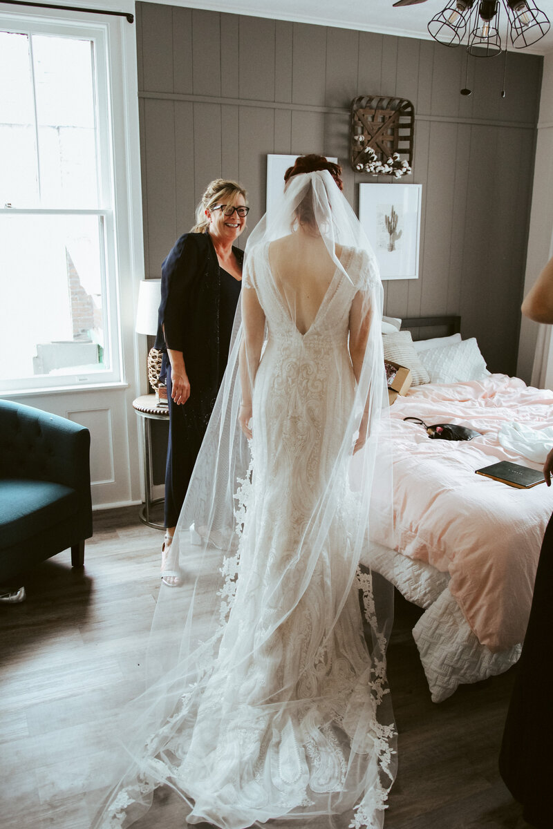 bride in a white wedding dress in a room