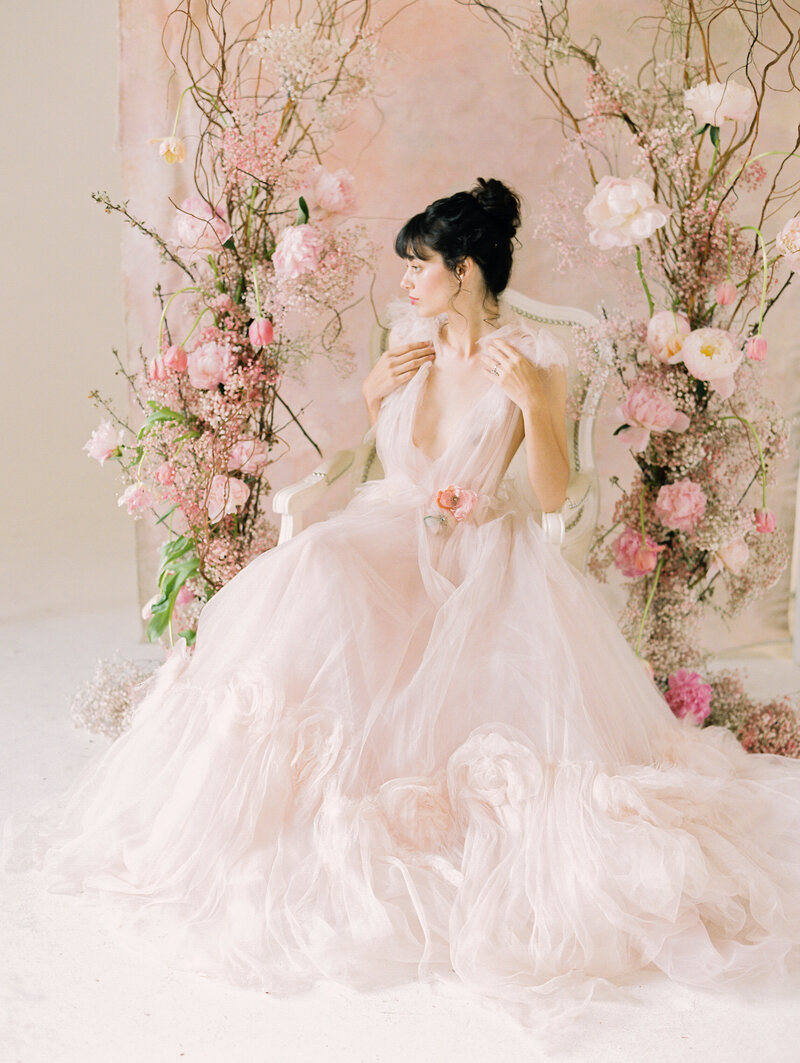 pink-wedding-dress-floral-arch-Stephanie-Brauer