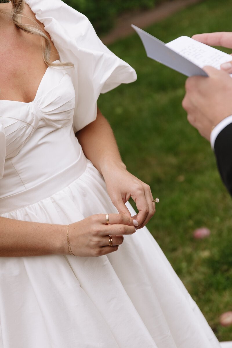 Bride and groom share private vows at wedding in Boise, Idaho by destination wedding photographer Erica Rochelle Photography