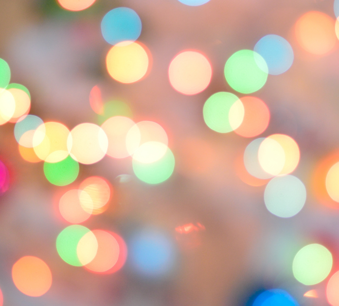 Colorful rainbow bokeh background symbolizing vibrant skin, hair, and nail benefits from Beauty Blend IV Vitamin Therapy at Refined Medical NY in East Setauket, Long Island.