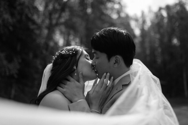 bride and groom walking on beach