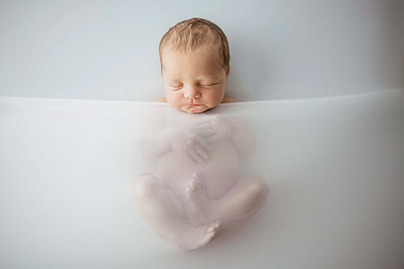 baby-in-neutral-wrap-maple-grove