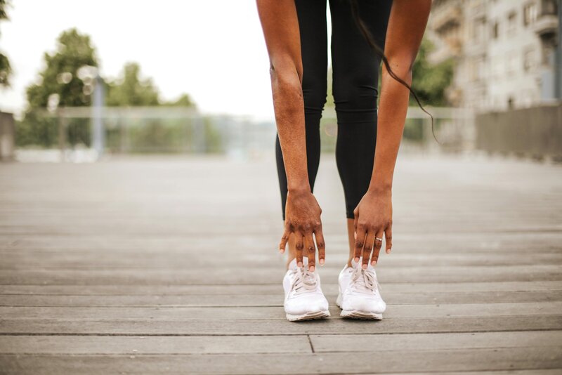 Photo of a woman stretching