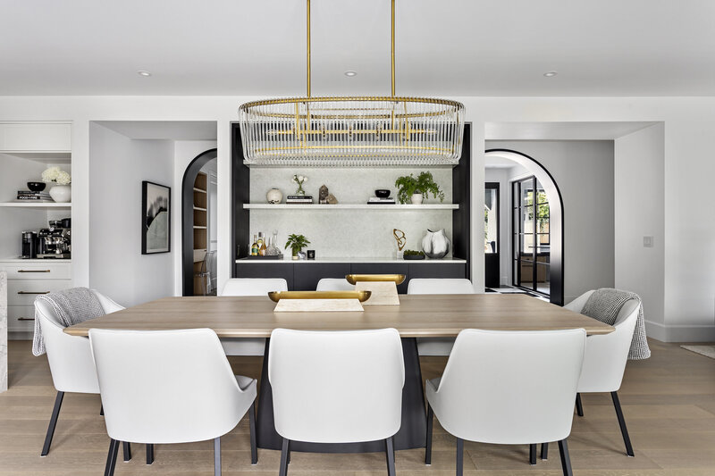 North Vancouver dining room with white oak table and white leather chairs