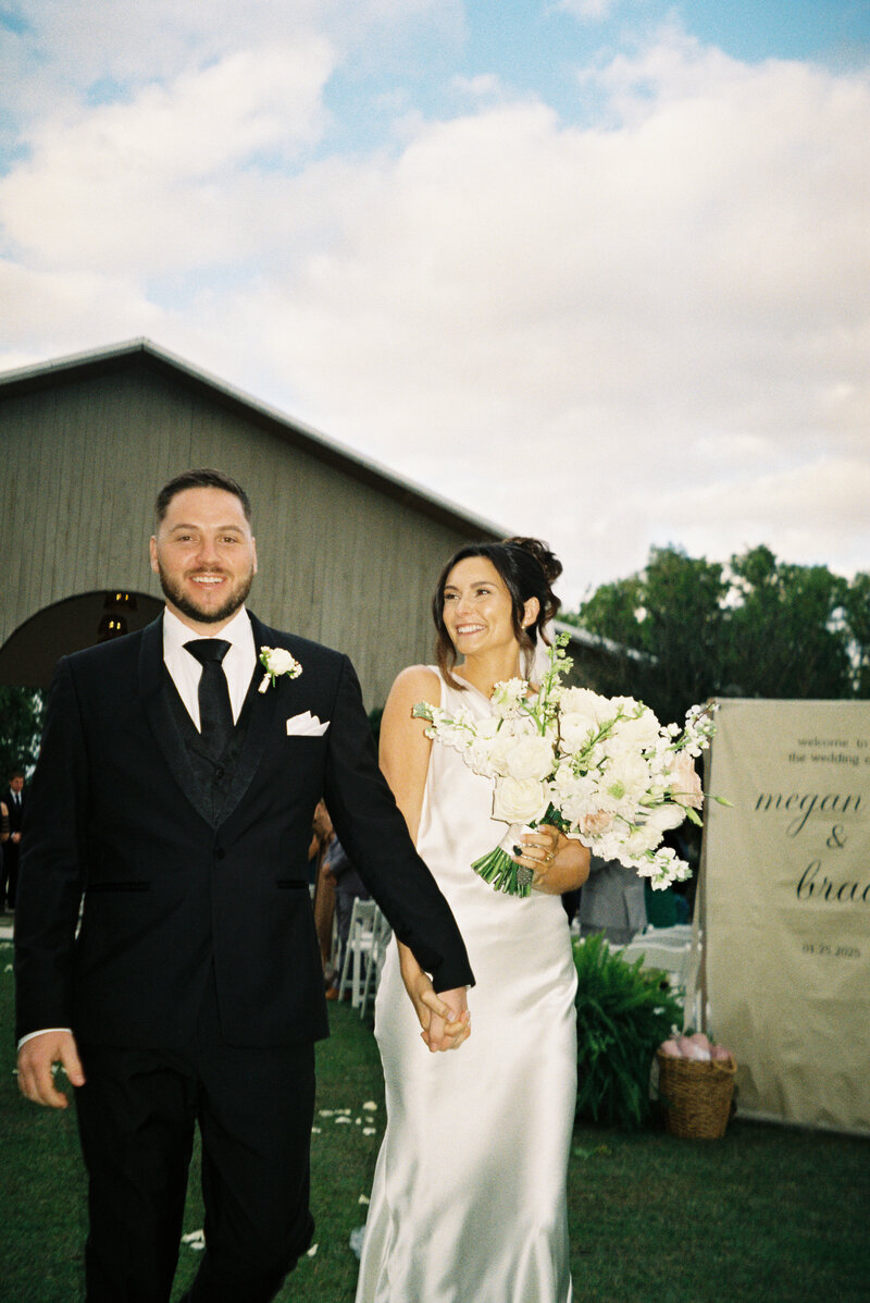 bride and groom dancing by wedding photographer and  videographer tampa fl