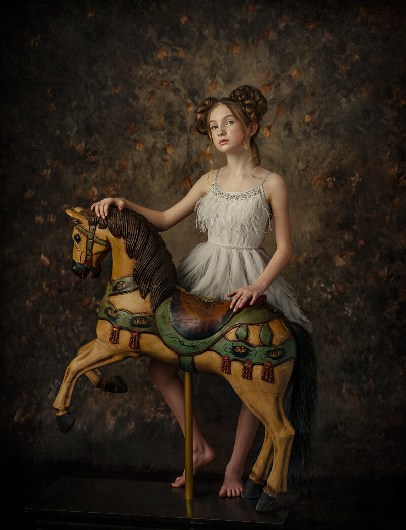 Eau-Claire-Wisconsin-Eliza-Porter-Photography-Portraits-Fine-Art-girl-carousel-horse-DSC2429