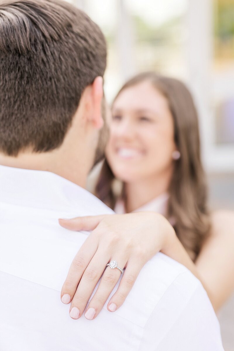 Halo engagement ring on fiance's shoulder | Birmingham Alabama photographer Amanda Horne