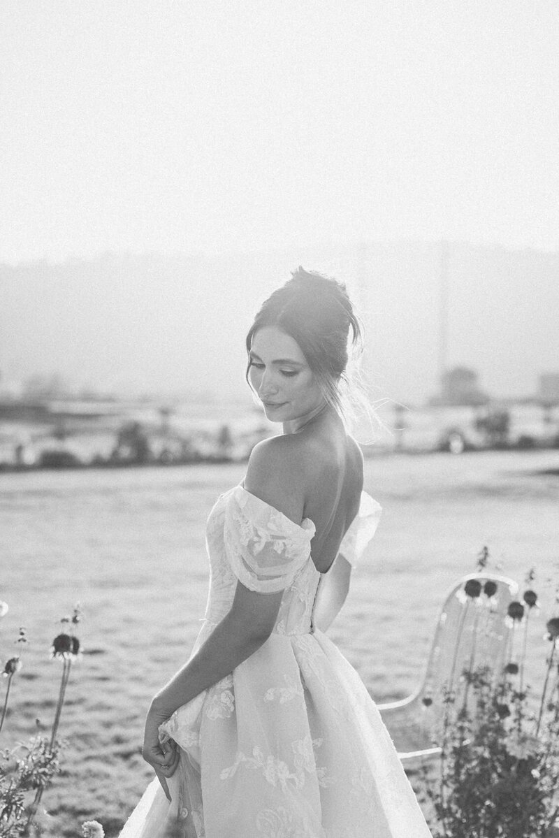 San Diego bride wearing off shoulder wedding dress with beautiful hair up do