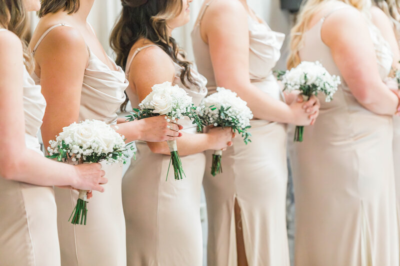bridesmaids holding their bouquets
