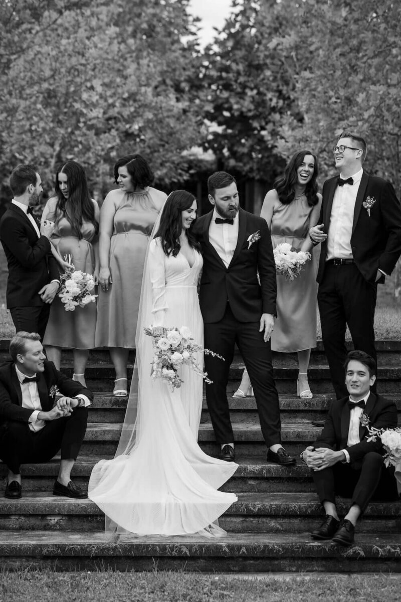 Picture of a couple and their bridal party chatting at the hunter valley wedding venue - Krinklewood Estate