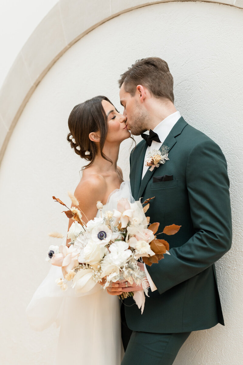 Mairead snuggles into her future husband as he rests his nose on her forehead during their engagement session in Windsor Ontario