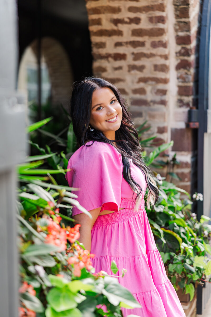 senior girl in pink dress in Charleston South Carolina