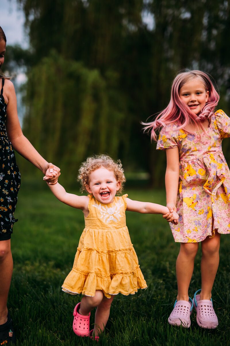 photo of kids laughing and playing at Forest Park