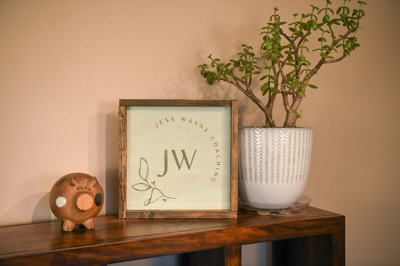 Framed photo with Jess Wayne logo
