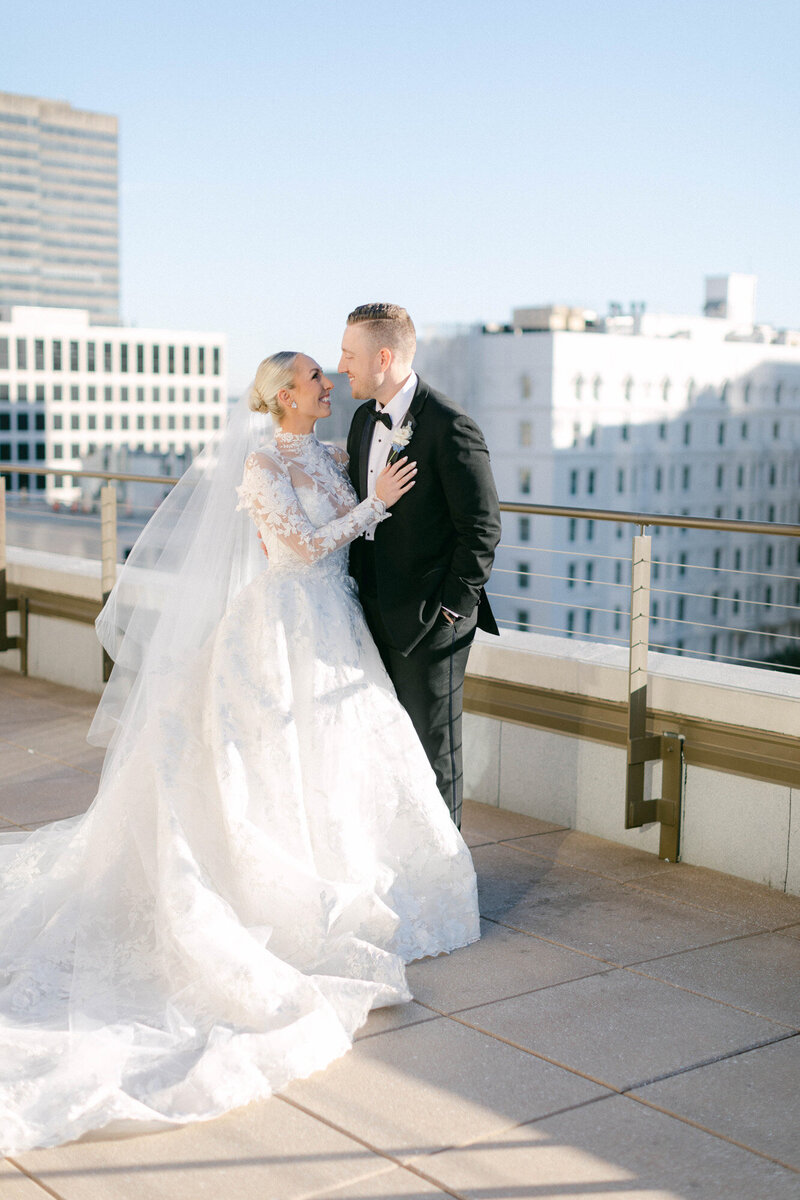 Kelly and Cody standing on a rooftop in New Orleans
