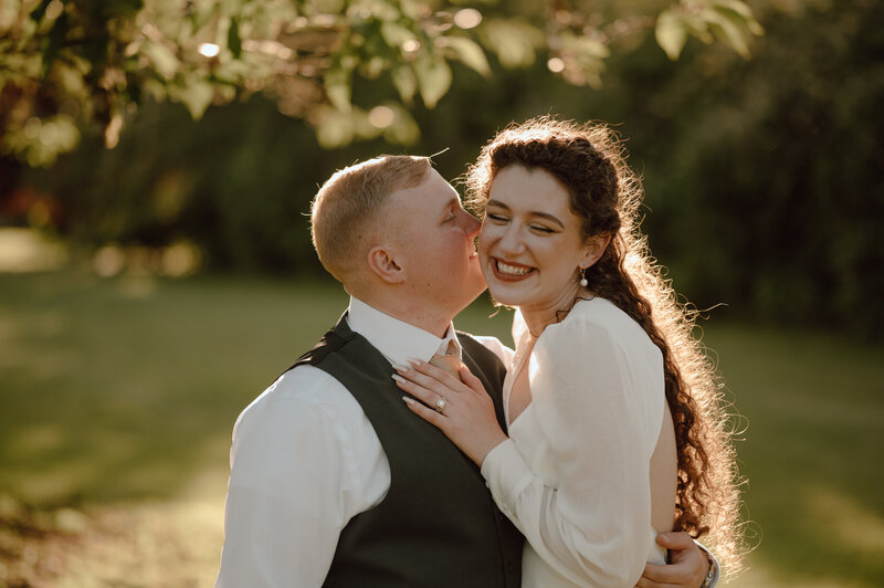 groom kissing bride