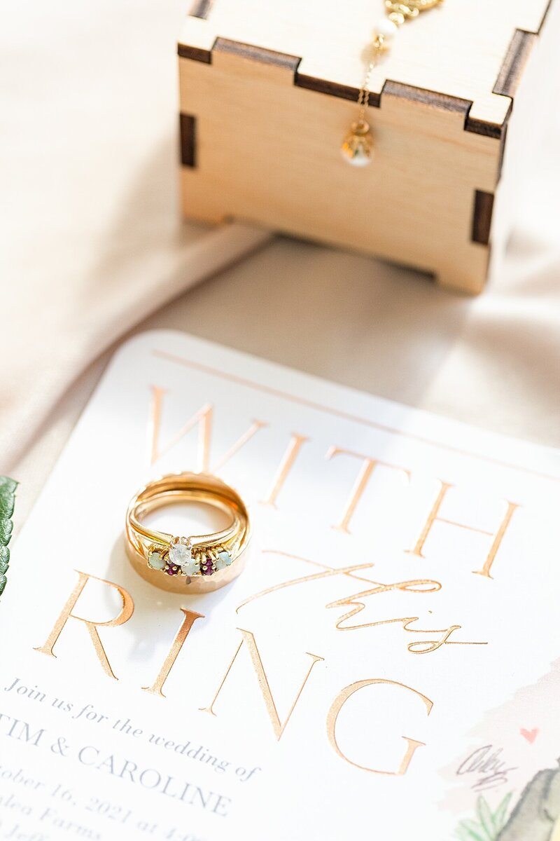 Wedding invitation suite and ring shot taken int the bridal suite at Avonlea Farms in Richmond, Virginia.