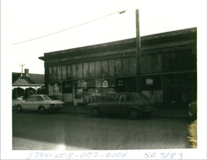 Historic black-and-white photo of the 717 First Street building in Snohomish, Washington — now home to Grain Artisan Bakery, a certified gluten-free café and bakery.