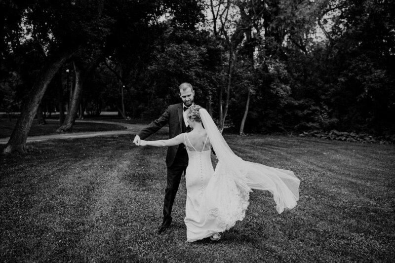 Bride and groom holding hands