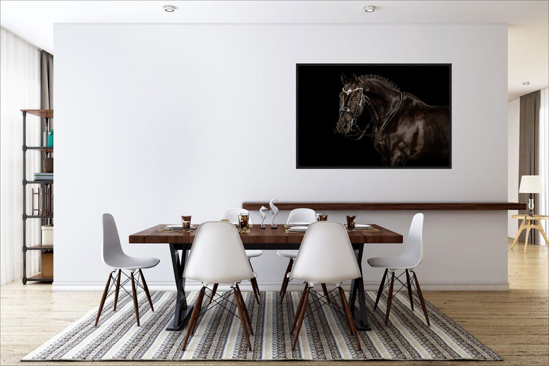 A dining room with white wall with a piece of large wall art showing a fine art portrait of a horse hanging on the wall
