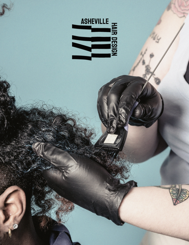 ad mockup for asheville hair design a tattooed woman color curly hair