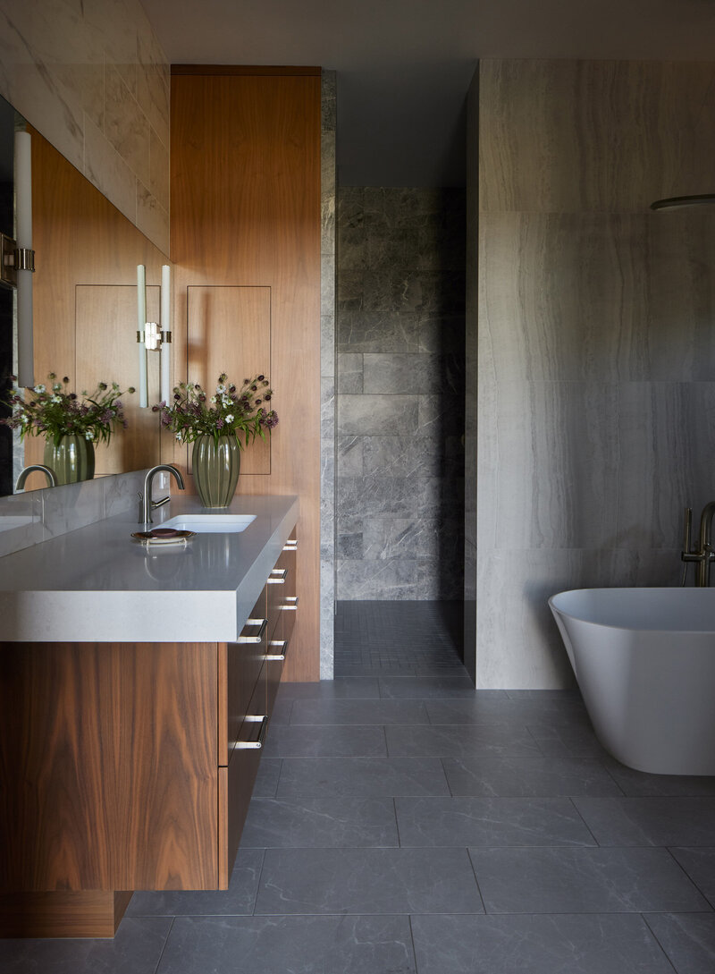 modern-master-bath-floating-vanity-natural-stone