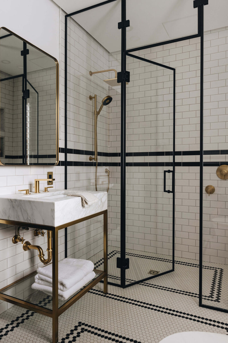 Modern shower design with checkerboard tiles and diamond pattern